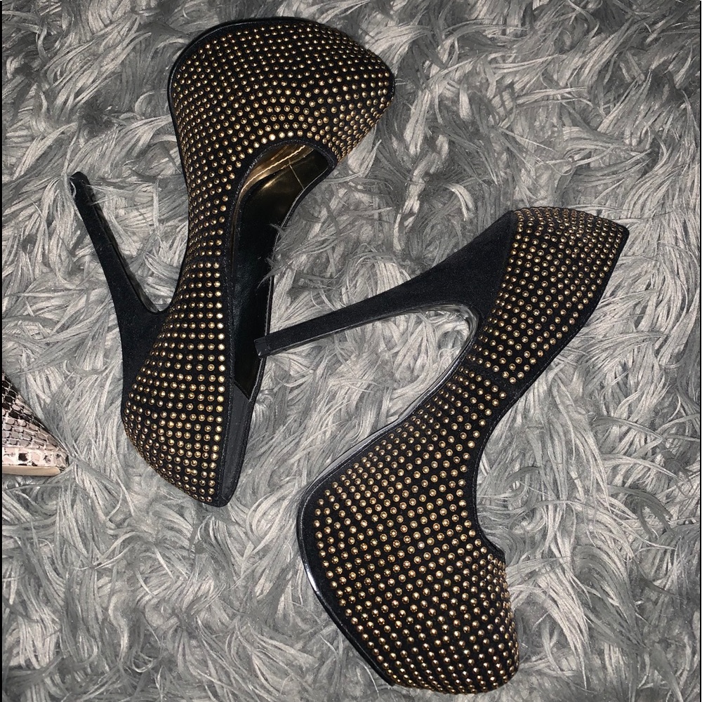 Gold and black heels